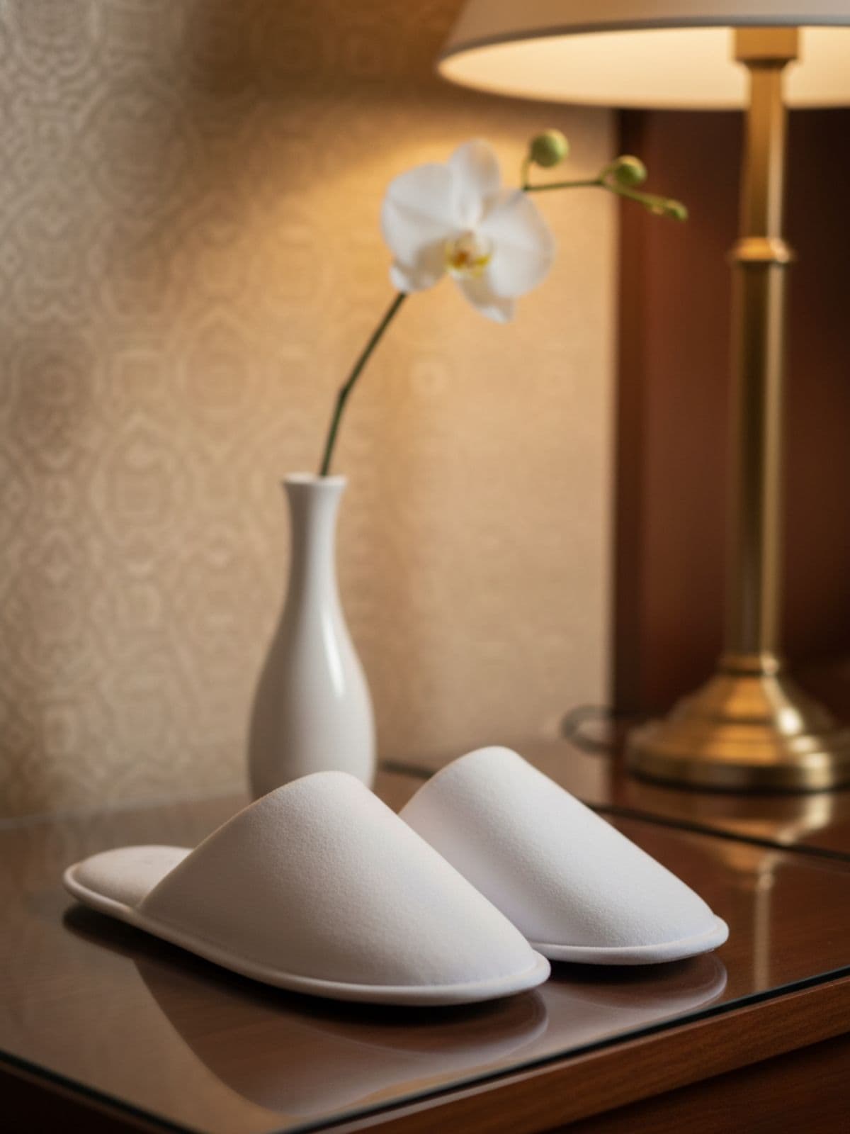 Hotel slippers in a luxury guest room