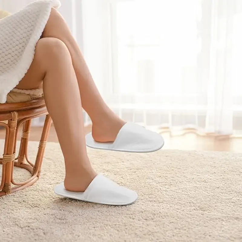 Custom hotel slippers with logo